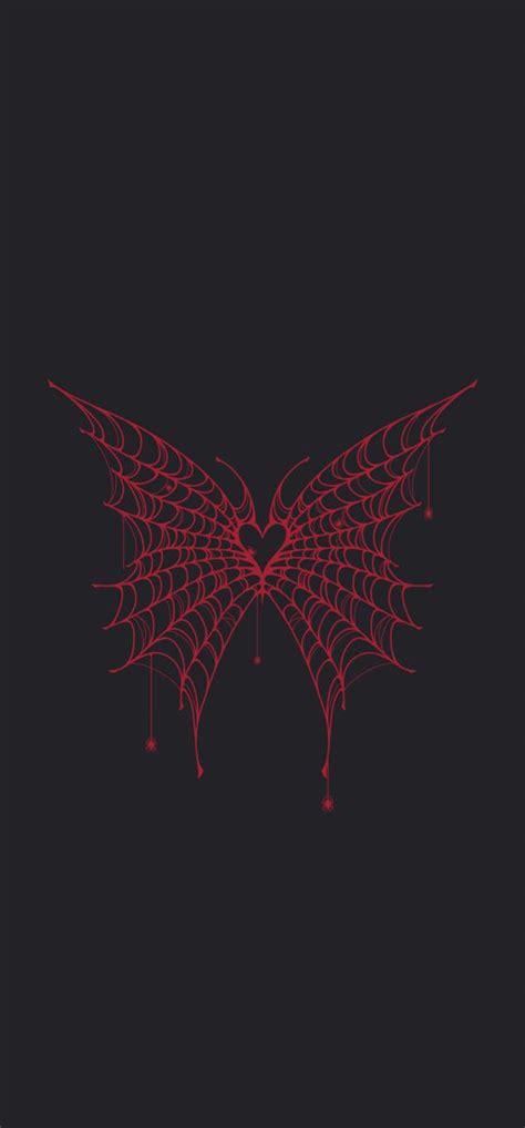 a red spider web on a black background