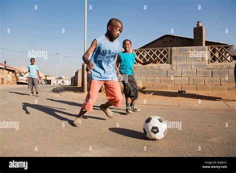 African Kids Playing Football