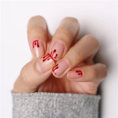 Red French Tip Manicures For Holiday Parties And Beyond