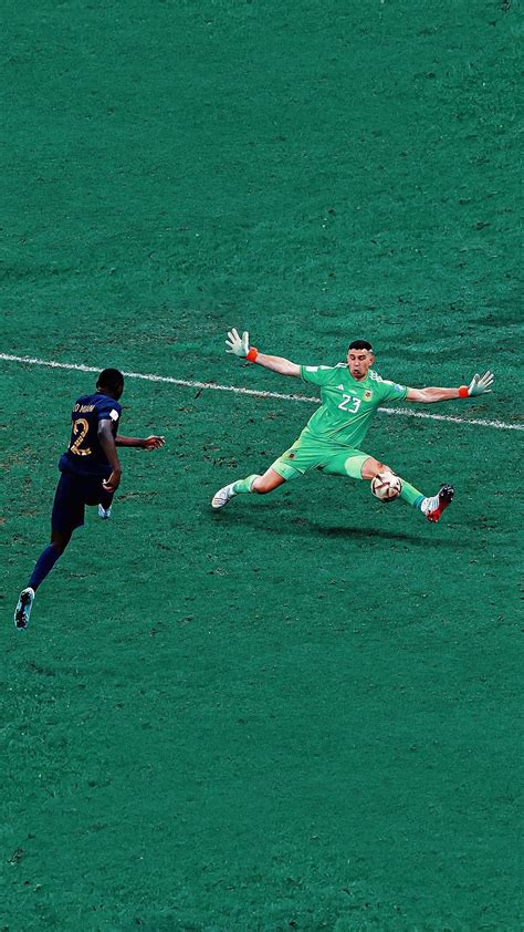 Two Soccer Players Colliding For The Ball During A Game