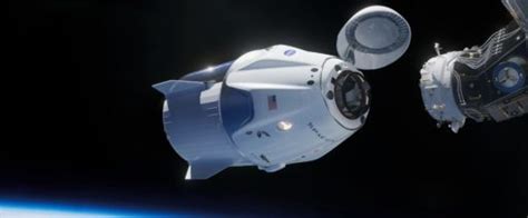 Spacexs Crew Dragon Flawlessly Docks With Space Station In Spectacular