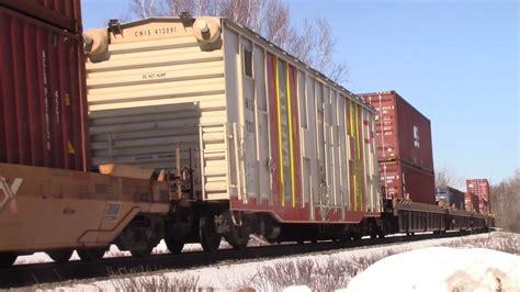 CN 100 Gevo Leads A Huge Stack Train CN 120 W Inspection Car DPU At