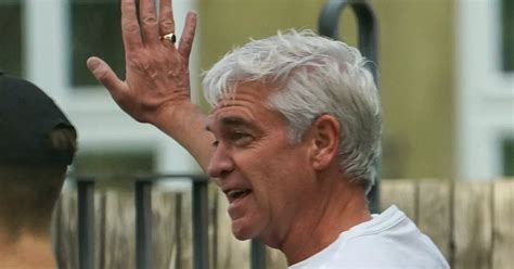 Phillip Schofield Assesses Damage To Neighbours Car After Tree Falls