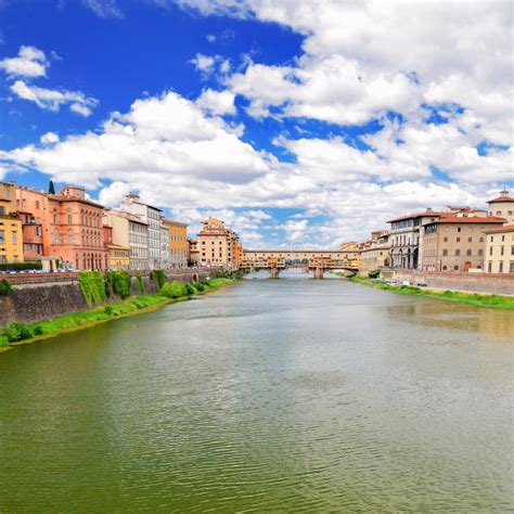 Picturesque View On Colorful Ponte Vecchio Over Arno River In Florence