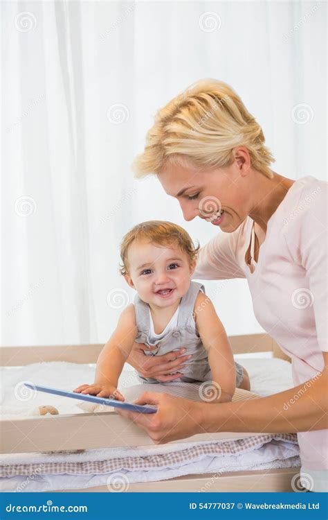 Smiling Blonde Woman With His Son Using Digital Tablet Stock Image Image Of Household