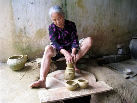 Woman Of Quao Pottery Village Kneading Soil Before Clay Ceramic