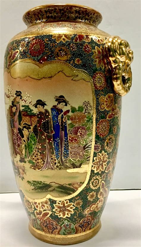 Japanese Satsuma Moriage Double Sided Hand Painted Lion Handle Vase At