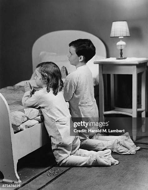 Kids Bedtime Prayers Photos and Premium High Res Pictures - Getty Images