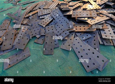 Steel Plates With Holes Stacked Together Stock Photo Alamy