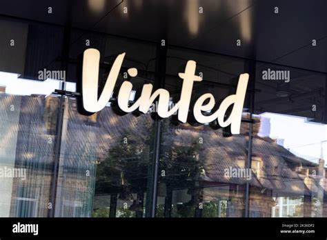 Vinted logo sign on main office, headquarters building wall. Vinted is ...