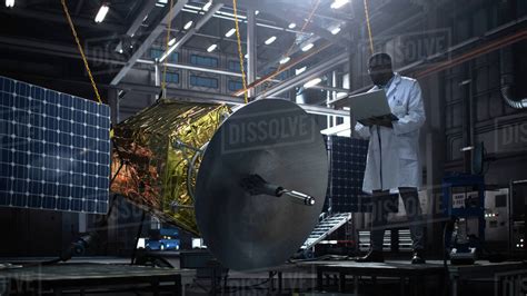 Industrial Engineer Working On Artificial Satellite Construction