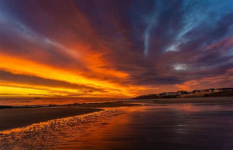 Dramatic Sunset Sky over the Beach · Free Stock Photo