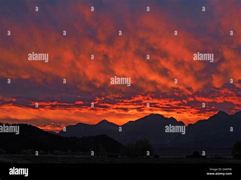 Sunset over the Teton Mountains Stock Photo - Alamy