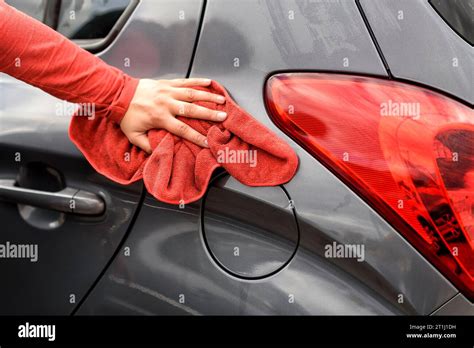 Polishing A Car With A Rag After The Car Wash Stock Photo Alamy