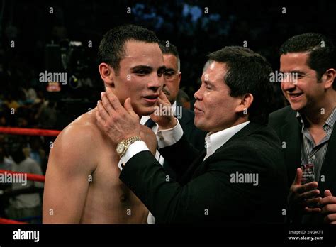 Julio Cesar Chavez Sr Right Congratulates His Son Julio Jr After His Son Defeated Grover