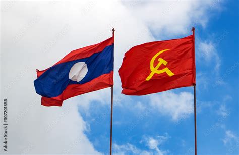 The Lao National Flag With The Red Flag With Communist Symbols Of A