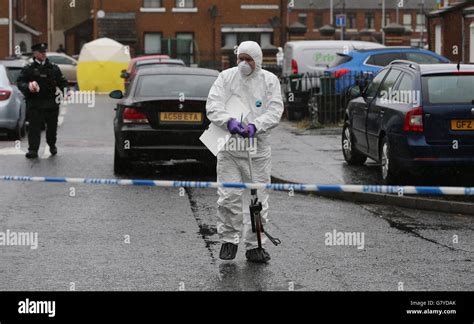 Police And Forensic Officers In Welsh Street Hi Res Stock Photography