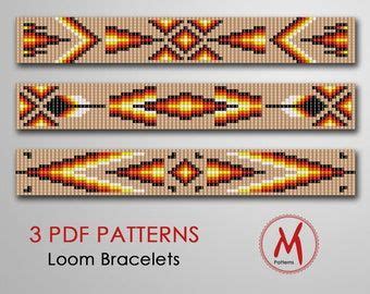 Three Beaded Bracelets With Different Patterns And Colors Each Made