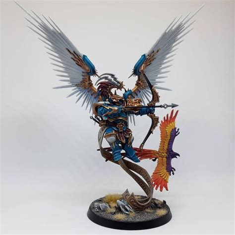 A Painted Warhammer With Two Large Wings