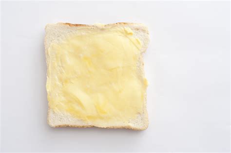 Buttered white bread - Free Stock Image