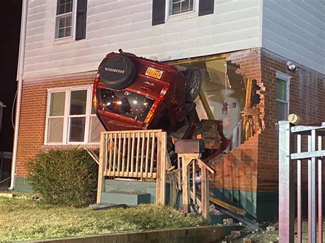 Wild Pics Reveal Crazy Crash Scene After Car Rams Into Porch And