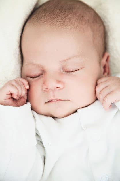 Premium Photo Portrait Of A Beautiful Sleeping Newborn Baby Boy