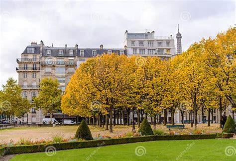 Autumn In Paris Town Homes Among Yellow Trees Background Eiffel Tower