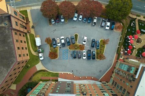 Premium Photo Aerial View Of Many Colorful Cars Parked On Parking Lot