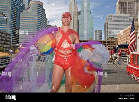 Gay Man In Female Clothing Participating In A Gay Pride Parade