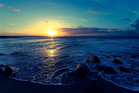 Imagen gratis Puesta del sol océano mar playa agua costa cielo