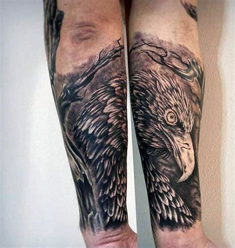 Gorgeous black and white eagle head tattoo on arm - Tattooimages.biz