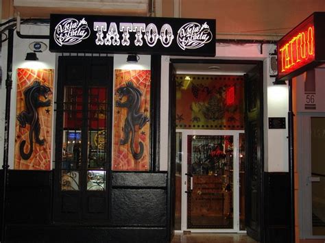 Cómo abrir un estudio de tatuajes Tienda de tatuajes