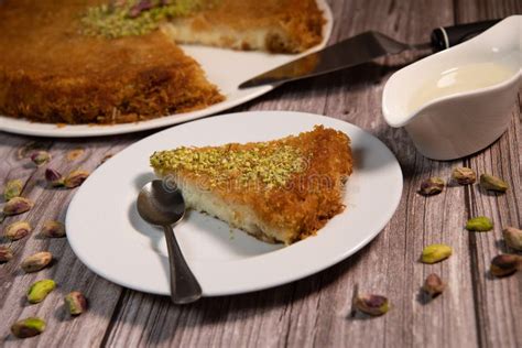 Delicious Traditional Dessert Knafeh with Cheese and Pistachios and ...