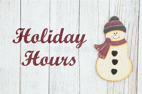 Holiday Hours Sign with Snowman Stock Photo - Image of vintage, sign ...