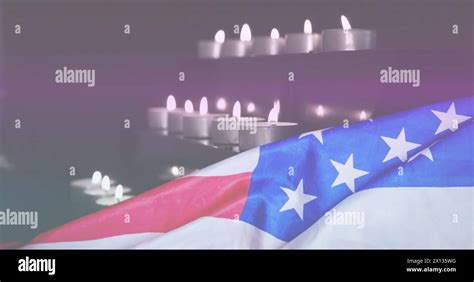 Image Of Light Trails Over Candles And Flag Of Usa Stock Photo Alamy