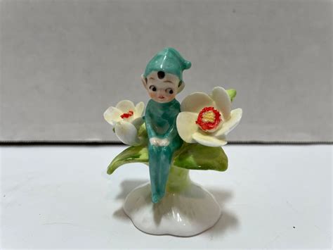 Napcoware Bone China Maruri Pixie Elf Yellow Flower Of The Etsy Mini Figurine Yellow