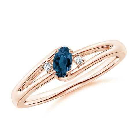 London Blue Topaz And Diamond Split Shank Ring Angara