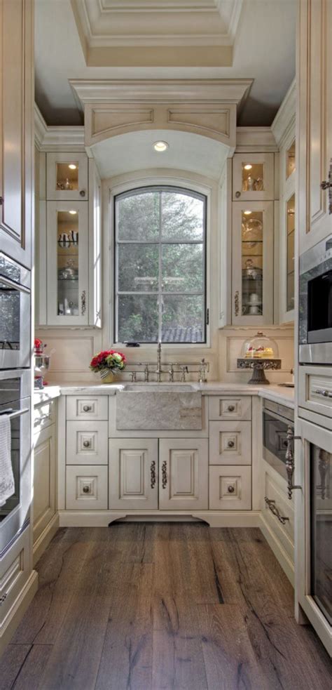 Beautiful Galley Kitchen Takes Advantage Of Vertical Space With