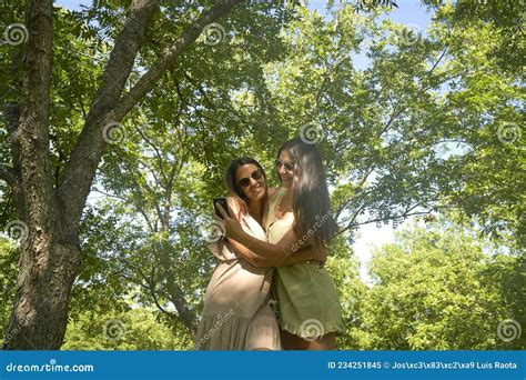 Happy Lesbian Couple Lying Together On Grass At Park Stock Image Image Of Life Length 234251845