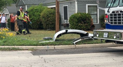 Watch Drivers Escape Injury In Neighborhood Rollover Crash