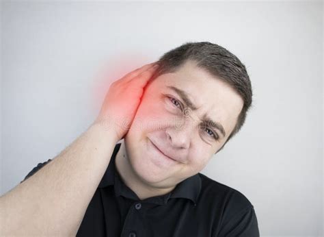 A Man Suffers From Pain In The Ear The Auditory Meatus Hurts Due To