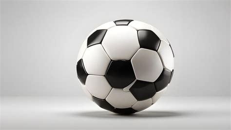 A Soccer Ball With A White And Black Soccer Ball On A Gray Background