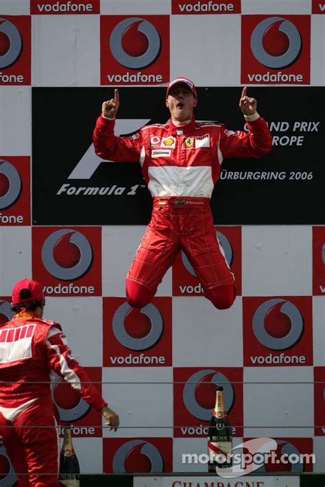 Podium: race winner Michael Schumacher celebrates at European GP