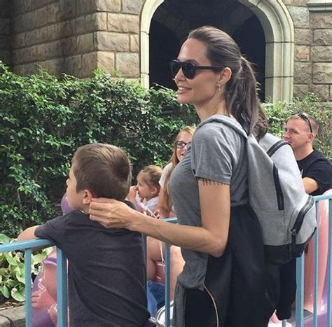 Angelina Jolie Takes The Family To Disneyland (3 pics)