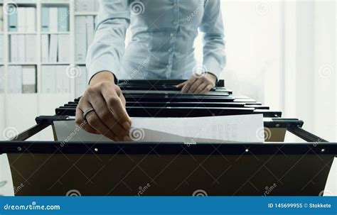 Office Worker Searching Files In The Archive Stock Image Image Of