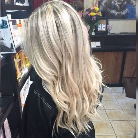 Platinum Blonde With A Long Layered Haircut Long Hair Styles Long Layered Haircuts Long Hair