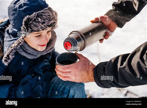 Father Pouring Hot Tea Hi Res Stock Photography And Images Alamy