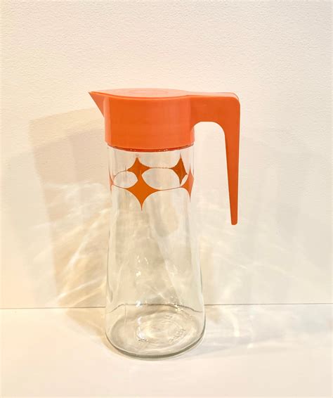 Vintage Tang Pitcher Atomic Era Anchor Hocking Orange Etsy Pitcher Atomic Era Glass Pitchers