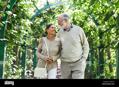 Seniors in park Stock Photo - Alamy