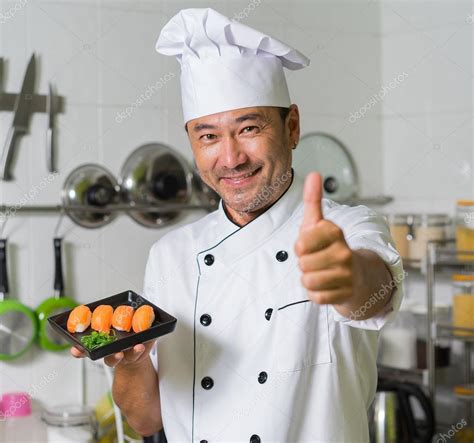 Asian chef on kitchen — Stock Photo © upslim #105278962